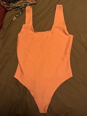 NWOT Parade Pink Bodysuit